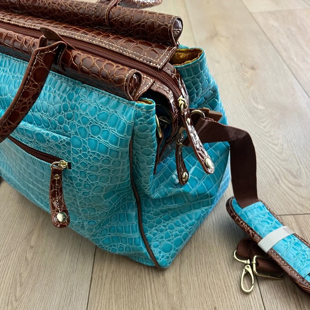 Samantha Brown NWOT blue and brown crocodile-embossed travel tote/weekender bag.